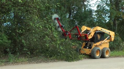 skid steer mounted tree saw|skid steer tree trimming attachment.